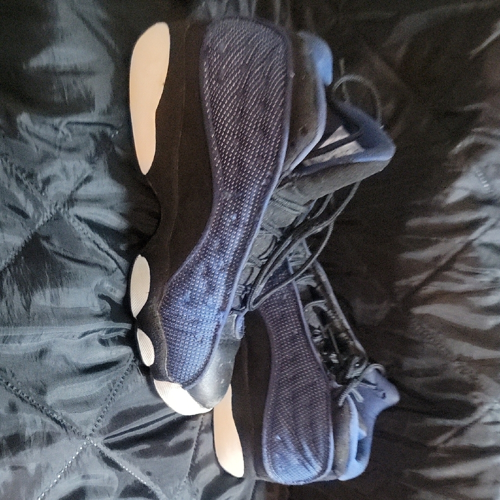 Jordan Blue and Black Athletic Shoes with Panther-Inspired Design